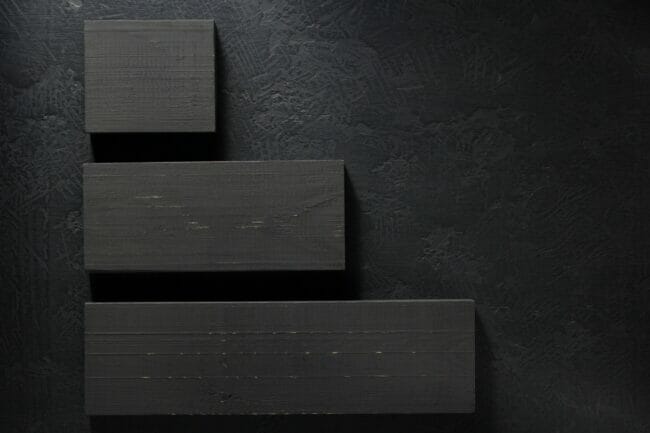 wooden board at black background